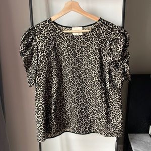 sézane sparkly leopard print blouse with puff sleeve
